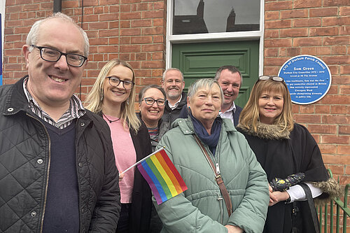 A group of people at the unveiling of the Sam Green plaque