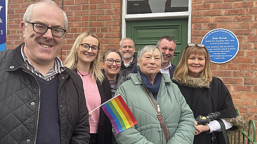 A group of people at the unveiling of the Sam Green plaque